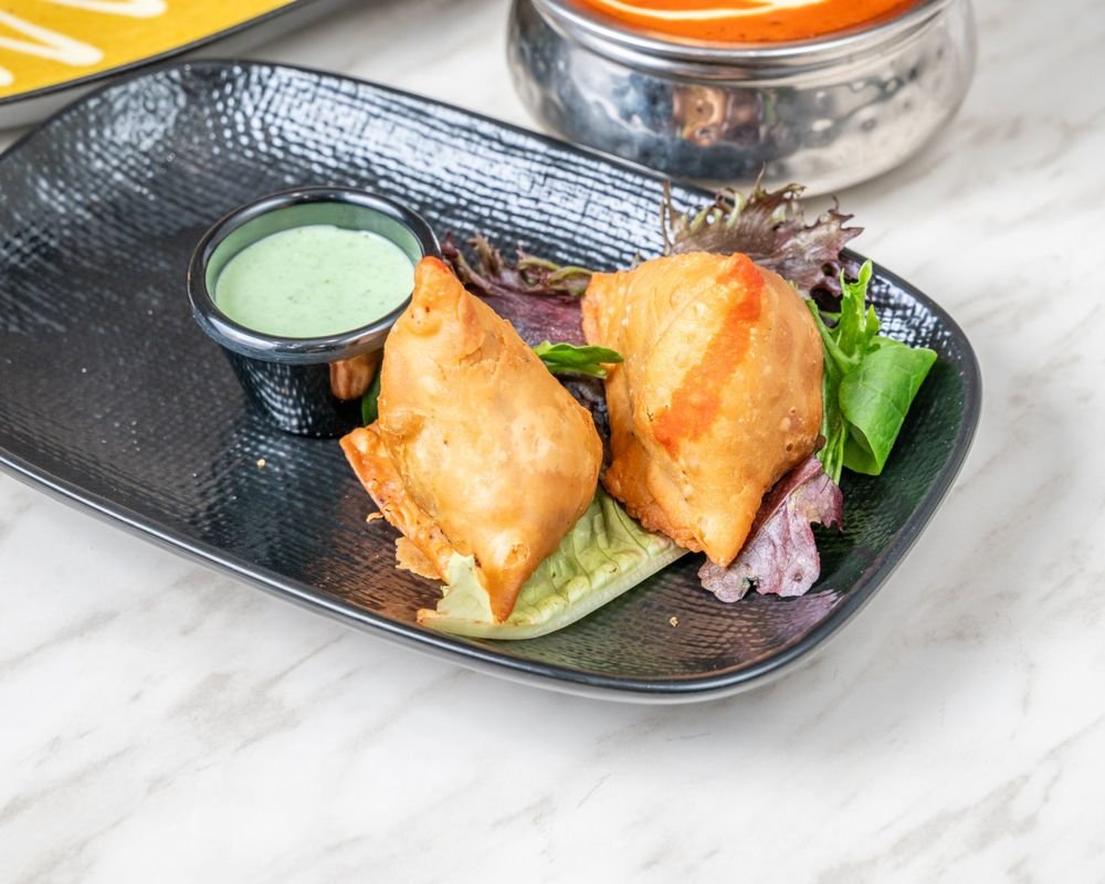 Samosas with mint chutney